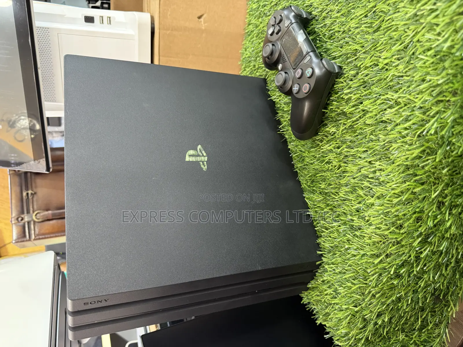 Playstation 4 Pro Console Display With One Controller and One Cd