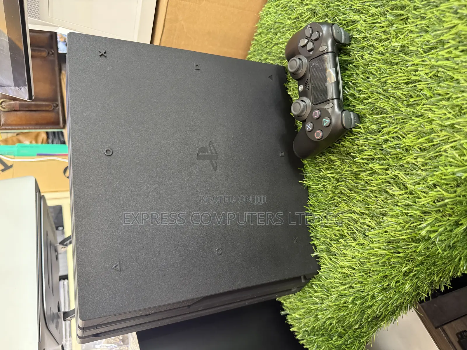 Playstation 4 Pro Console Display With One Controller and One Cd