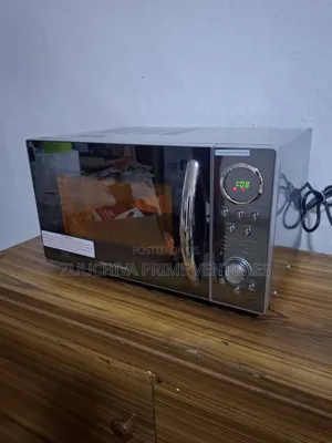 23.L Morphy Richards Digital Microwave From Uk