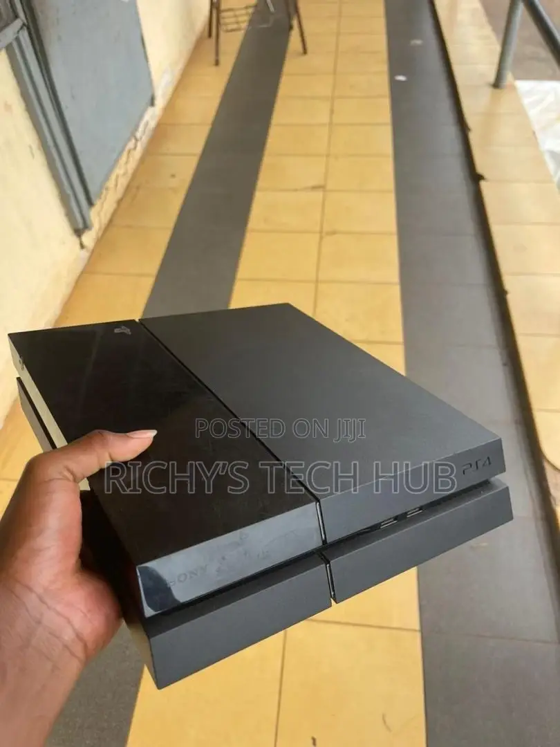 Neat Playstation 4 Slim With 11 Games and 2 Original Gamepads