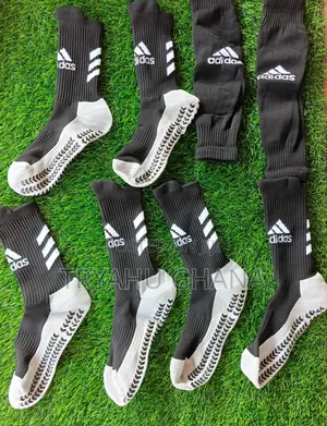 Authentic Adidas Football Players' Socks And Holes
