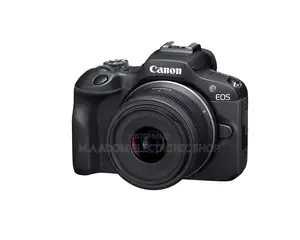 Canon Eos R100 With 18-55 Mm Lens