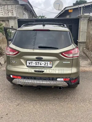 Ford Escape SE 4dr SUV AWD (1.6L 4cyl Turbo 6A) 2014 Gold