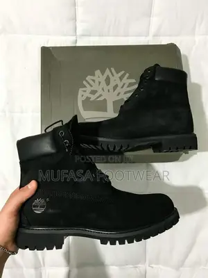 Black Timberland Premium 6-Inch Waterproof Boots.