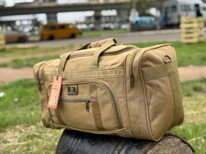 Khaki Canvas Duffle Bags With Large Storage Capacity and Has Straps