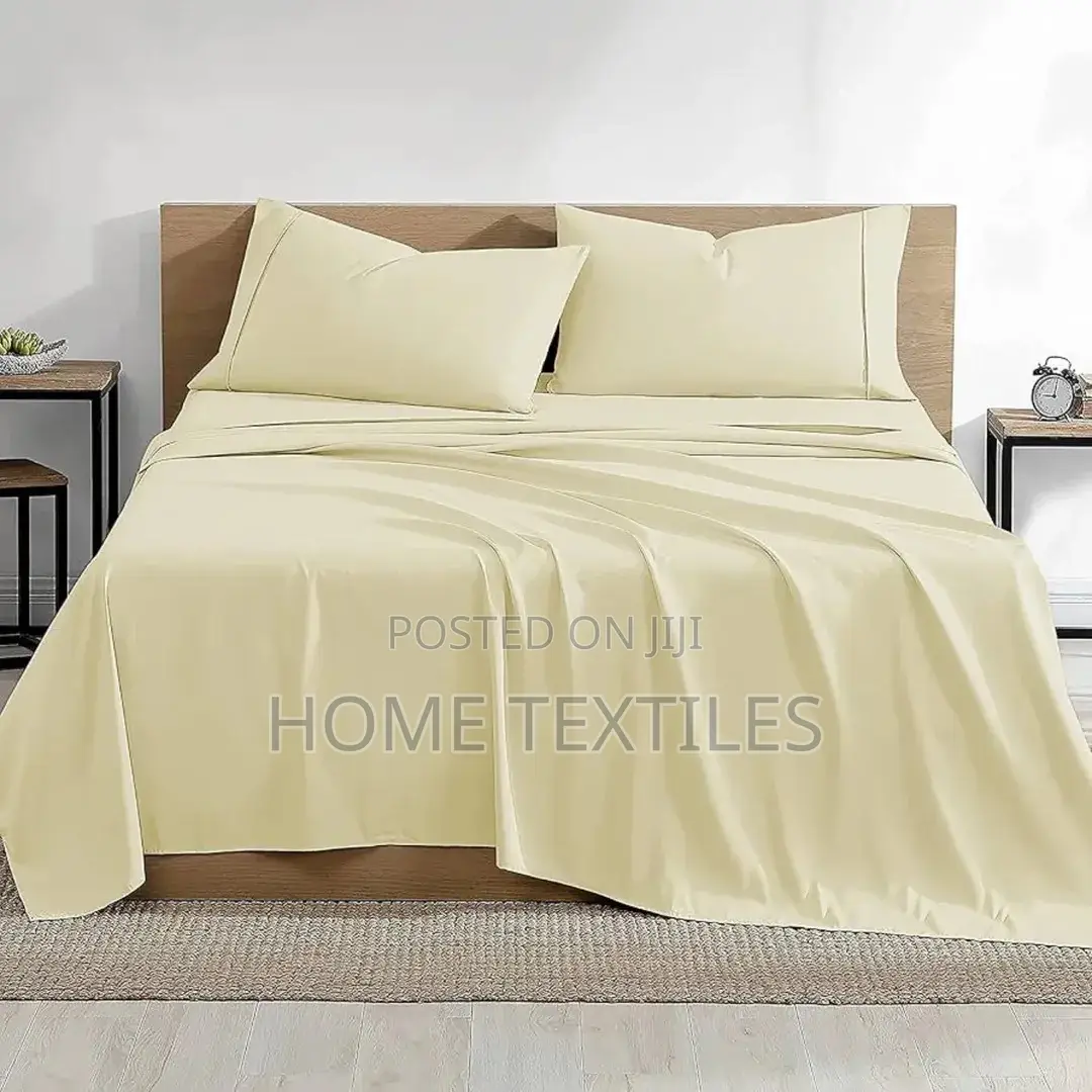 Cream Colored 2 Bedsheets and 4 Pillowcases 1 Fitted and 1 Flat Sheet