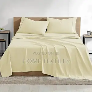 Cream Colored 2 Bedsheets and 4 Pillowcases 1 Fitted and 1 Flat Sheet