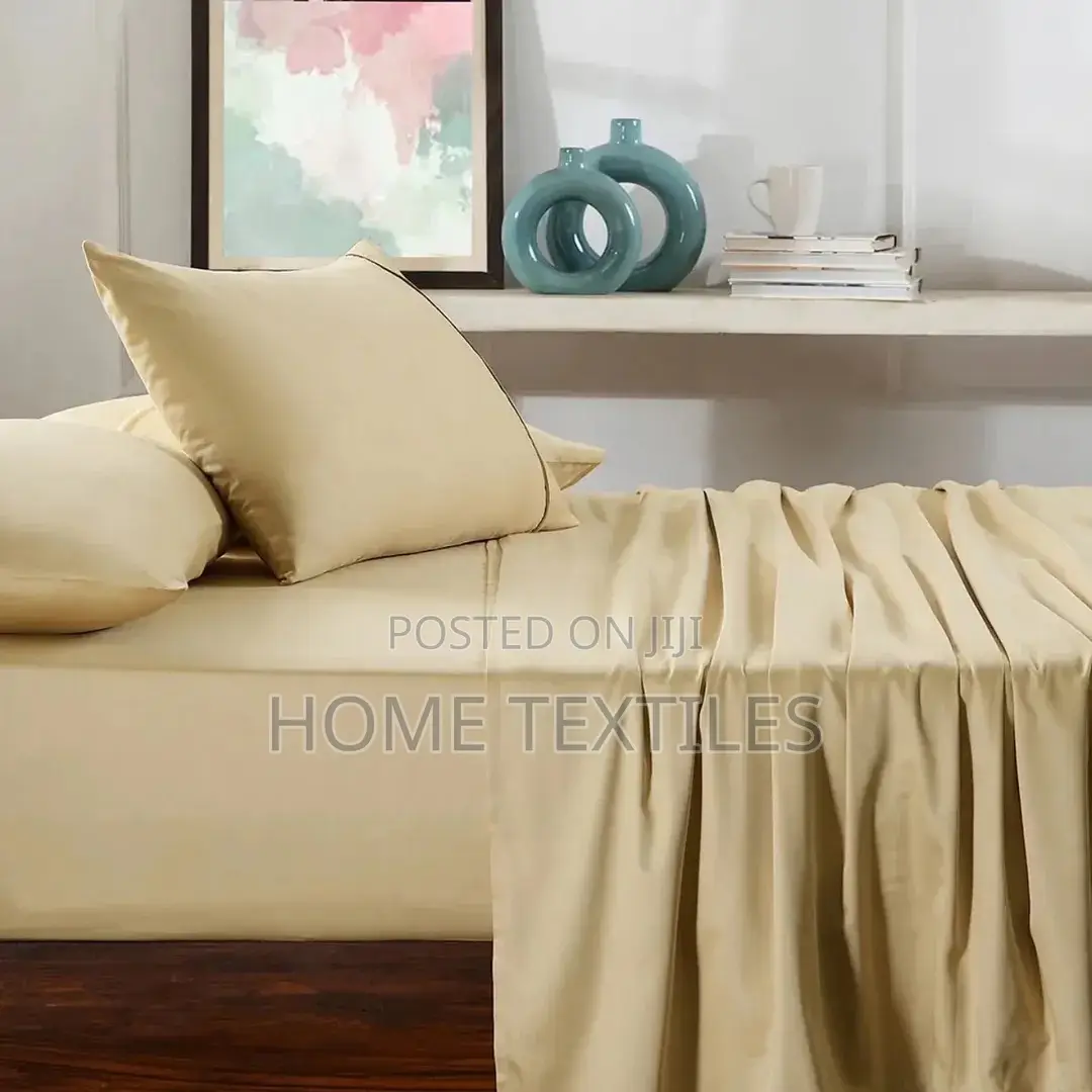 1 Fitted Beige Bedsheet ,1 Flat Beige Bedsheet and 4 Pillowcases