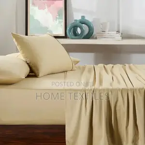 1 Fitted Beige Bedsheet ,1 Flat Beige Bedsheet and 4 Pillowcases