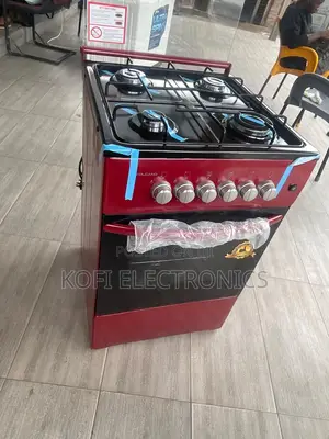 Vintage Artisan Red Gas Stove With Elegant Front Controls