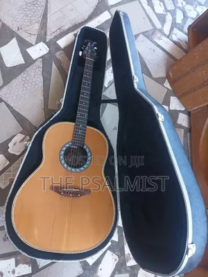 Matrix by Ovation in Solid Case With Strap New Set of Strings