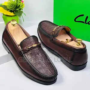 Clarks Leather Coffee Loafers With An Embossed Crocodile Pattern