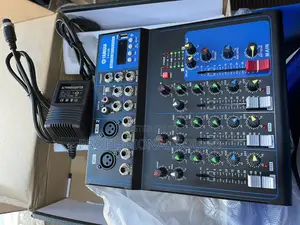Yamaha F4usb, a 4-Channel Audio Mixer Console.