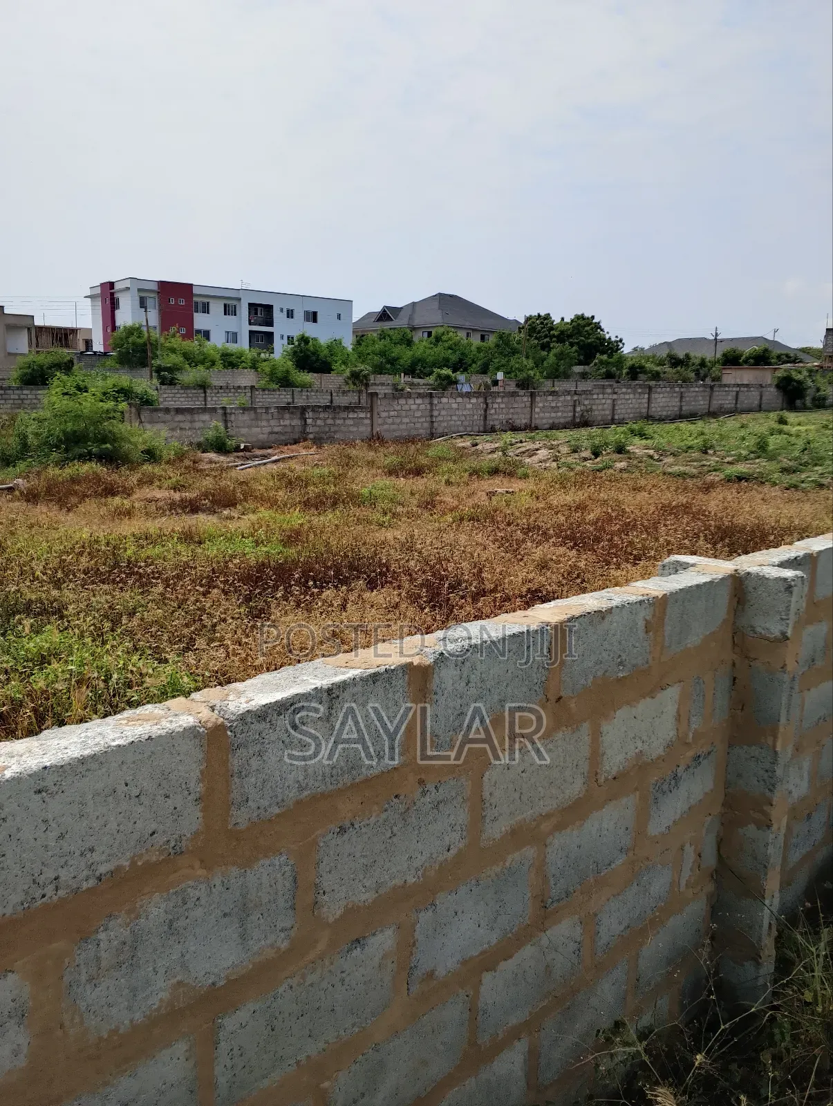 A Half Plot Fully Fenced at Celebrity Golf Course Area Sakomono