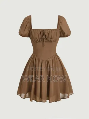 Puff Sleeve Ruched Bust Ruffle Hem Dress.