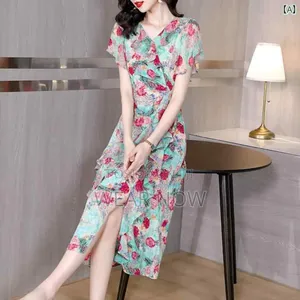 Floral Print Midi Dress With A V-neck And Short Flutter Sleeves