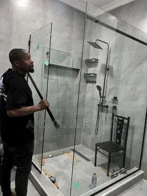 L-shaped Custom Slide Shower Enclosure.