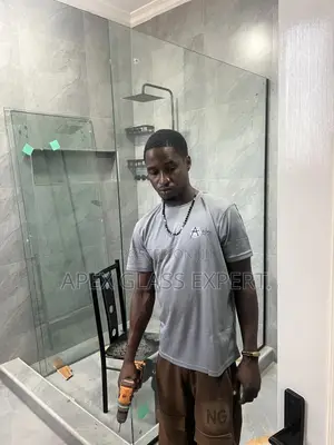 L-shaped Custom Slide Shower Enclosure.
