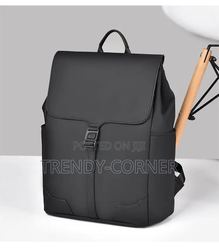Leather-Trimmed Canvas Backpacks