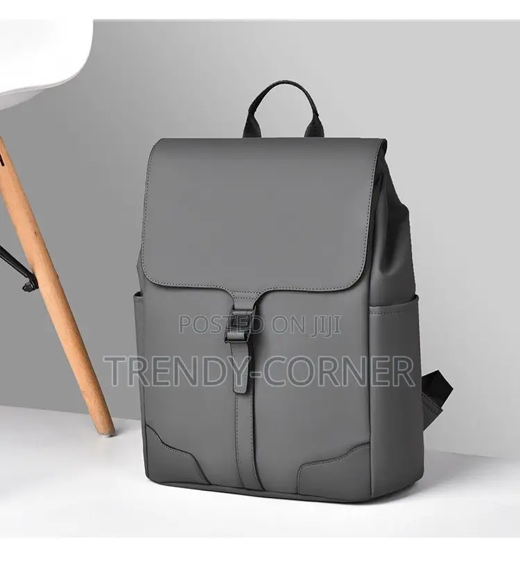 Leather-Trimmed Canvas Backpacks