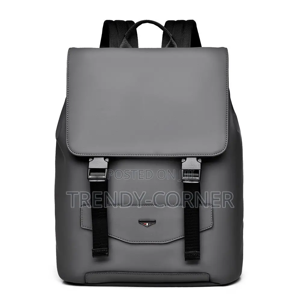 Leather-Trimmed Canvas Backpacks