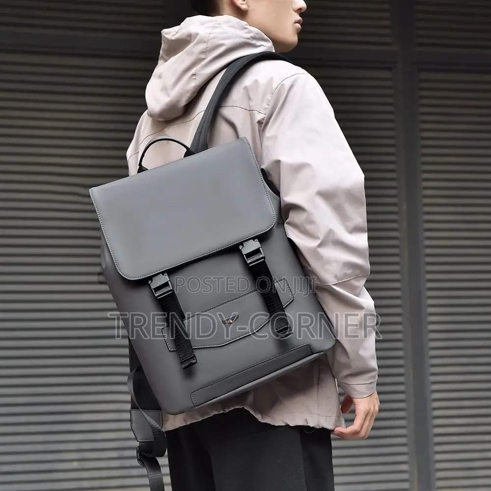 Leather-Trimmed Canvas Backpacks