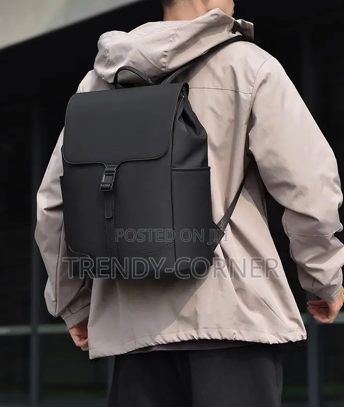 Leather-Trimmed Canvas Backpacks