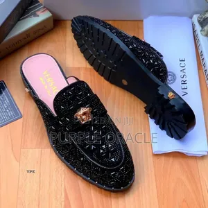 Black Versace Half Shoe With a Crystal-Embellished and a Gold-Tone