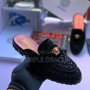 Black Versace Half Shoe With a Crystal-Embellished and a Gold-Tone