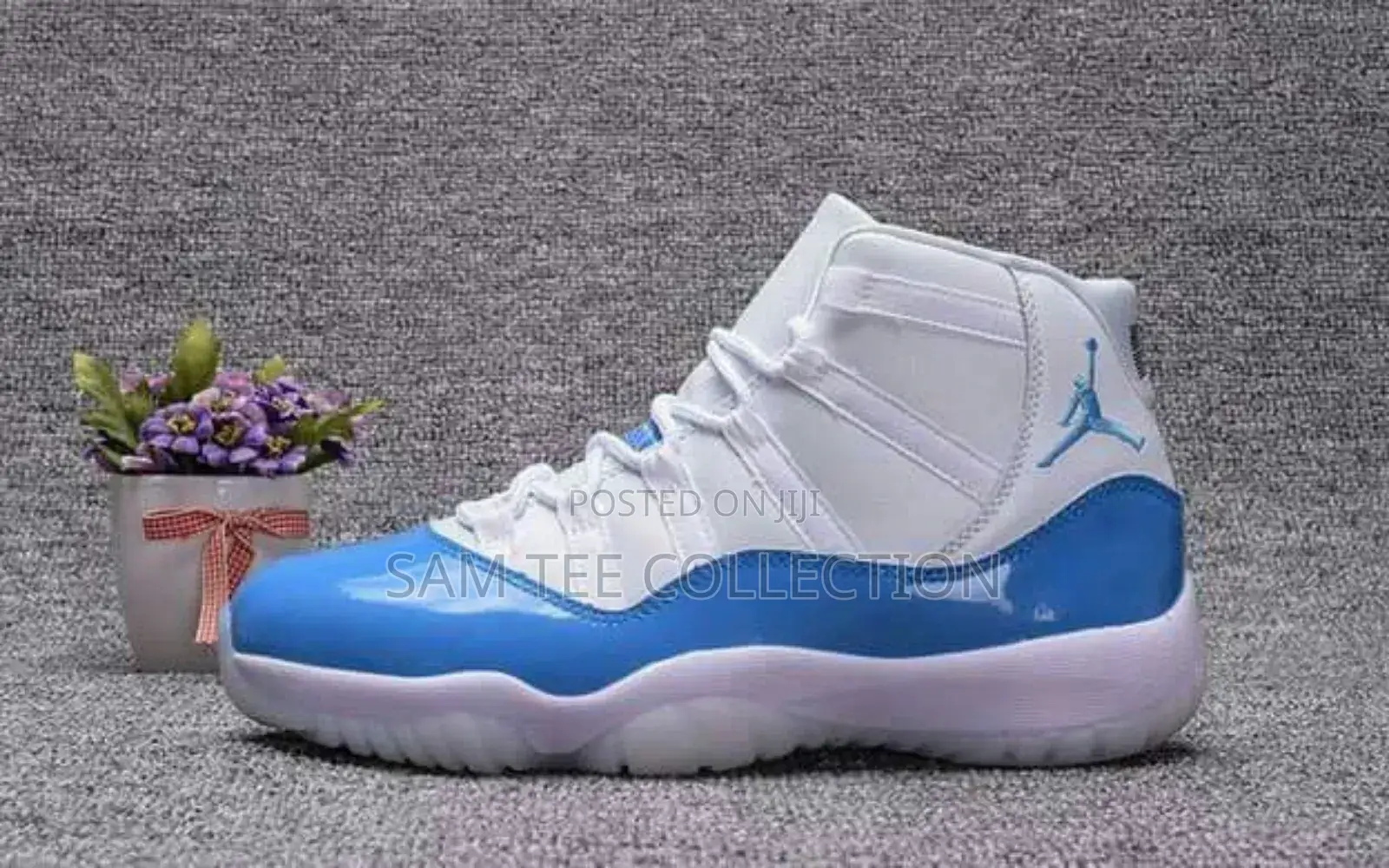 Nike Air Jordan 11 Low. Retro Concord. Black White and Blue White.