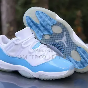 Nike Air Jordan 11 Low. Retro Concord. Black White and Blue White.