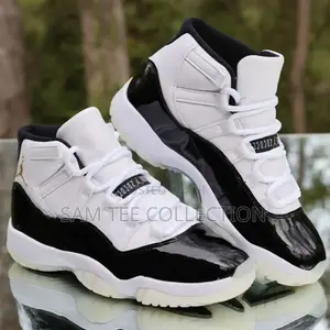 Nike Air Jordan 11 Low. Retro Concord. Black White and Blue White.