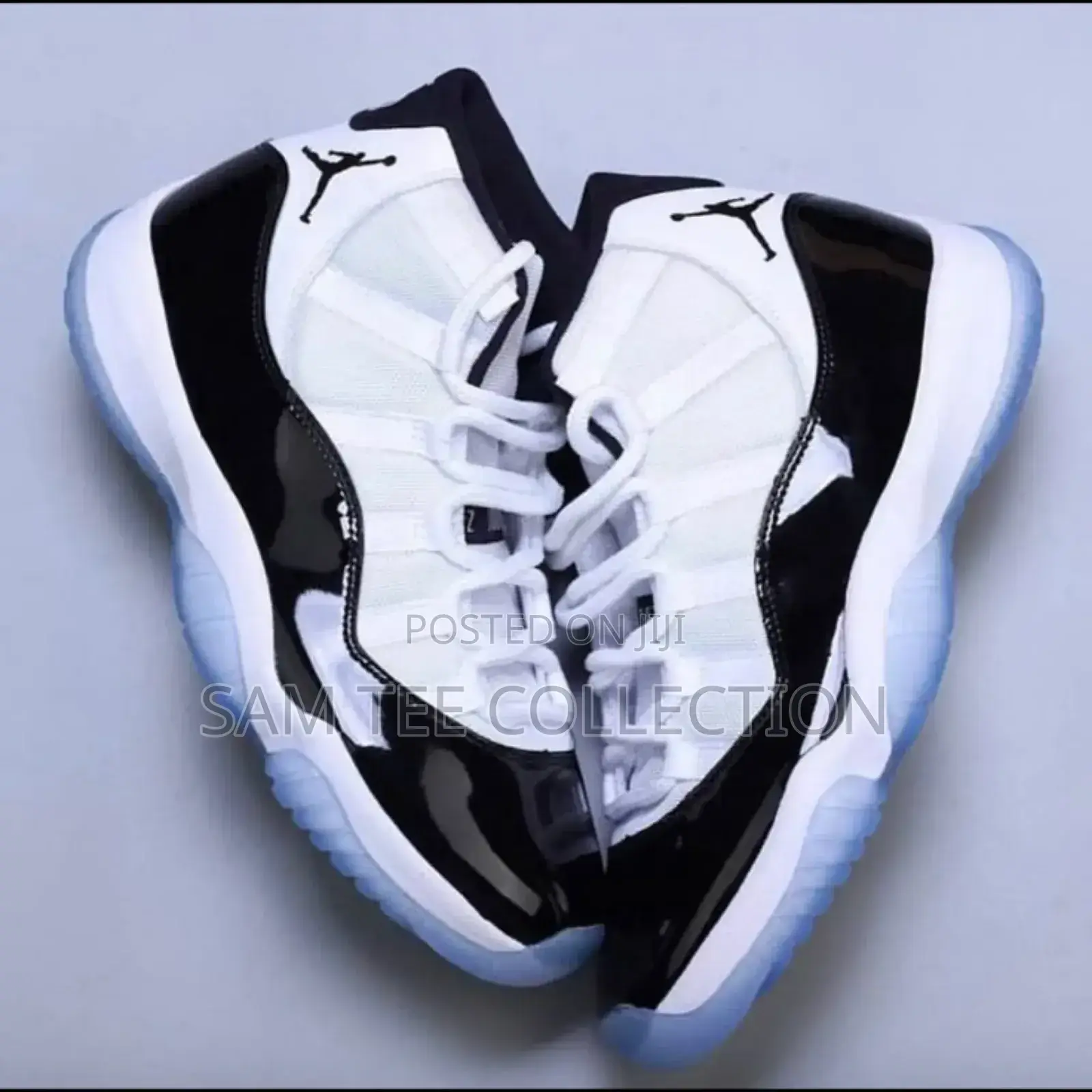Nike Air Jordan 11 Low. Retro Concord. Black White and Blue White.