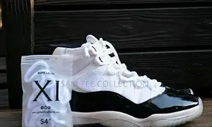 Nike Air Jordan 11 Low. Retro Concord. Black White and Blue White.