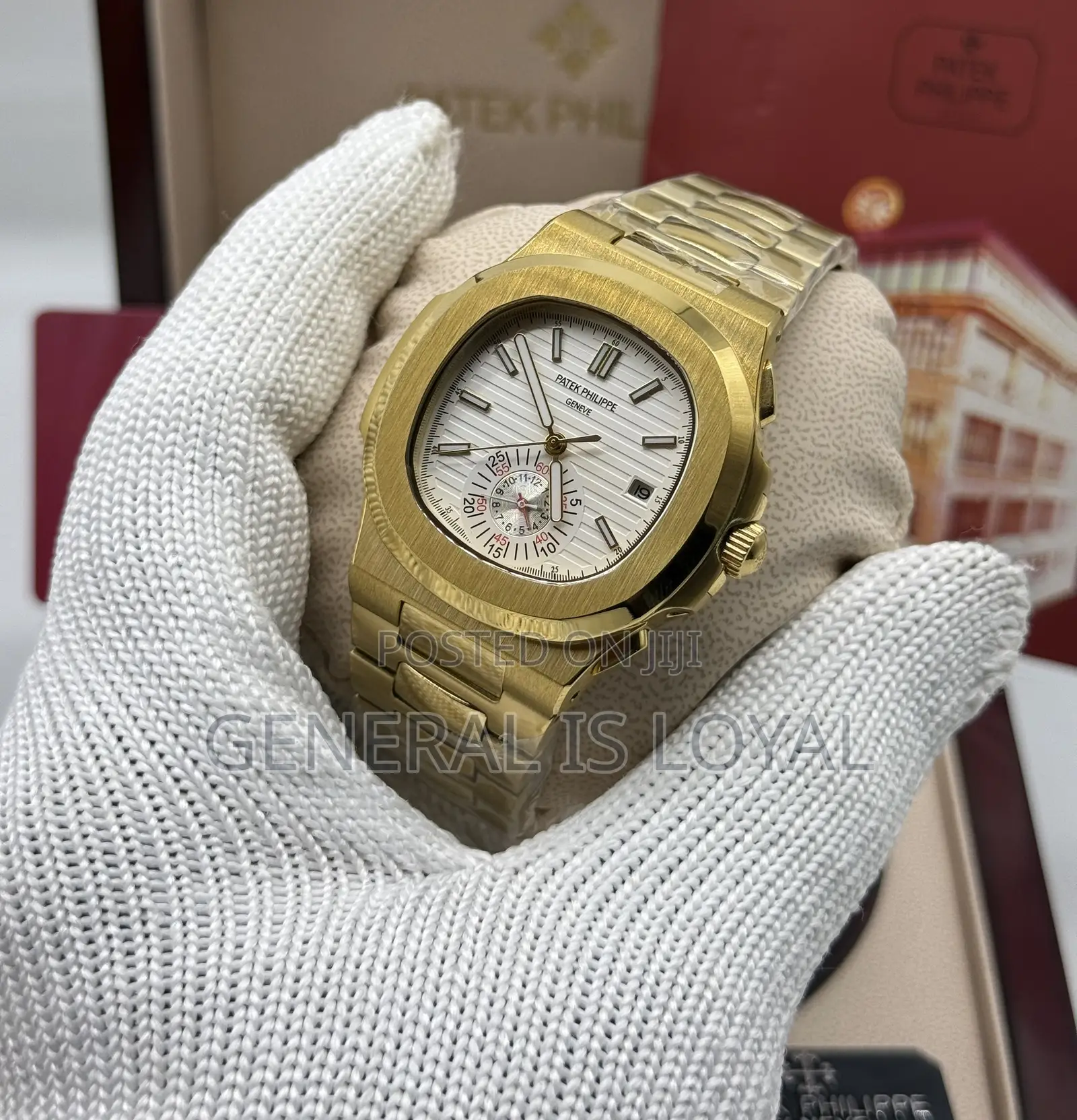 Patek Philippe Nautilus Chronograph Gold Black Dial Watch