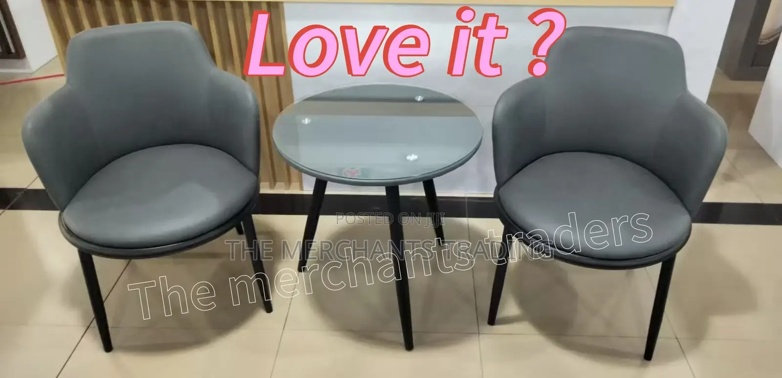 Two Set Leather Couch Chairs With Glass Table.