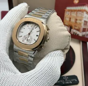Patek Philippe Two Tone Stainless Steel Nautilus Watch  Black Dial.