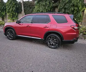 Honda Pilot EX-L 8 Passenger 2WD 2024 Red