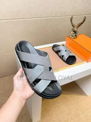 Hermès Kazimir Sandal In Black Calfskin And Woven Ribbon.