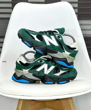 New Balance 9060 in Green, Black, and Blue.