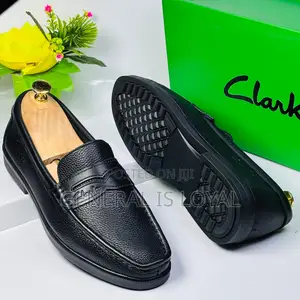 Black Leather Clarks Men's Penny Loafers.