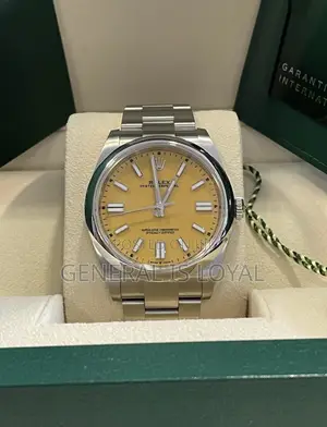 Rolex Oyster Perpetual 41mm Yellow Baton Dial And An Oyster Bracelet