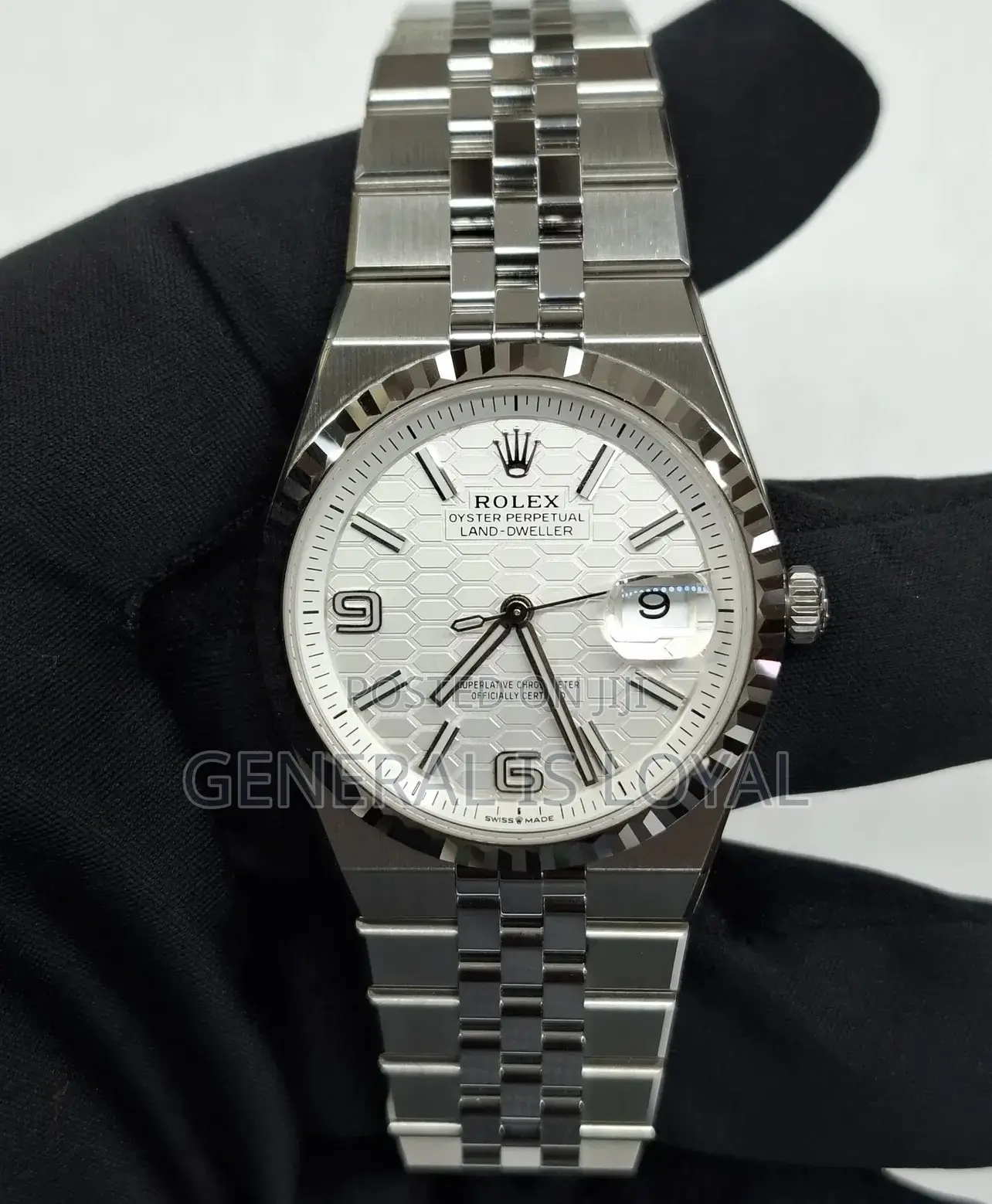 Rolex Oyster Perpetual Land-dweller 40mm Stainless Steel Watch.