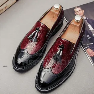 Men's Two-Tone Patent Leather Brogue Loafers With Tassels.