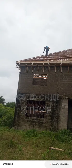 Son of Man Roofing Company And