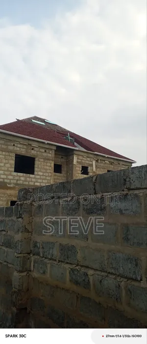 Son of Man Roofing Company And