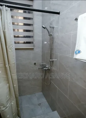 2 BDRM Vacation Apartment With Water Heater Kitchen at Kumasi Suame