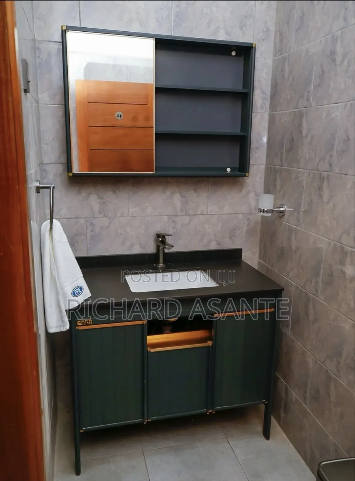 2 BDRM Vacation Apartment With Water Heater Kitchen at Kumasi Suame