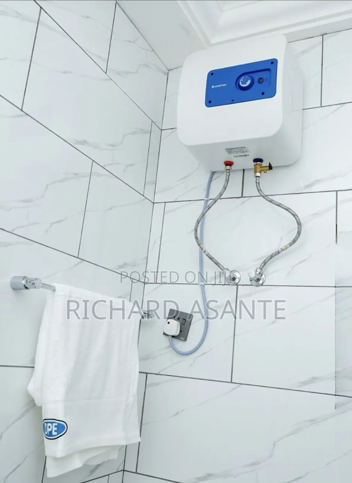 2 BDRM Vacation Apartment With Water Heater Kitchen at Kumasi Suame