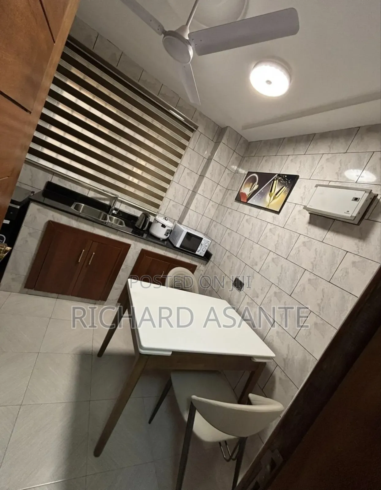 2 BDRM Vacation Apartment With Water Heater Kitchen at Kumasi Suame